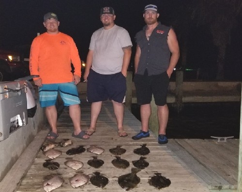 3 HAPPY GUYS WITH FLOUNDER