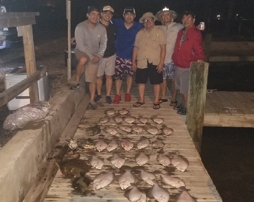 6 GUYS WITH FLOUNDER