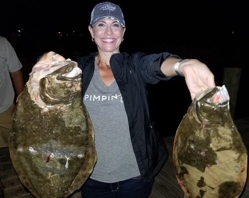 LADY HAPPY WITH 2 FLOUNDER